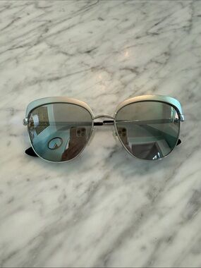 Prada Silver Frame Women's Sunglasses with Mirrored Lenses